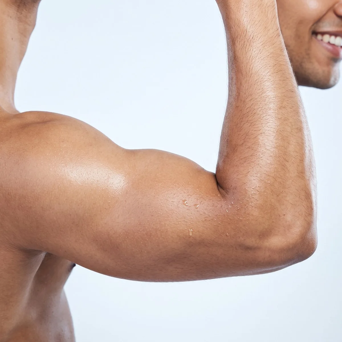 Close-up of a contoured upper arm after CoolSculpting at BHRC