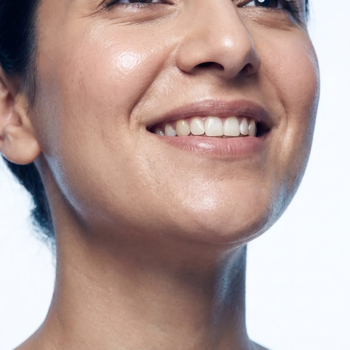 A BHRC provider assessing the chin and jawline of a patient